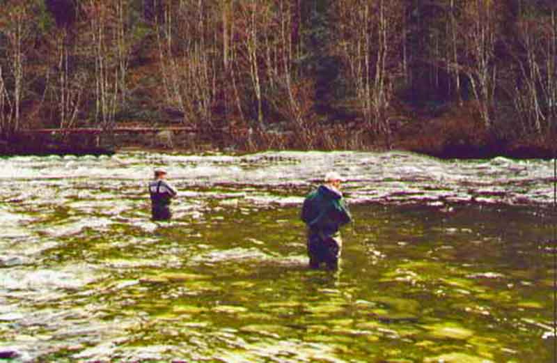 photo of two anglers fishing the Conuma River in Nootka Sound