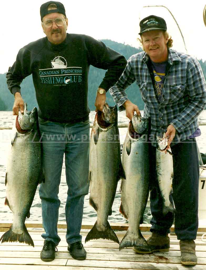 photo of Brian and Paul with their day's catch of salmon in Nootka Sound